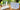 Collection of Skin Culture Peels and skincare products on a wooden surface with a blurred natural background.