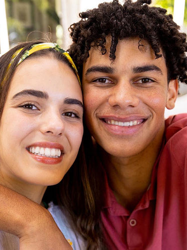 SKIN CULTURE - YOUNG CAUCASIAN WOMAN & YOUNG BLACK MAN